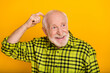 © deagreez - Photo of old man pensioner finger touch head try to remember forget bad memory look empty space isolated over yellow color background