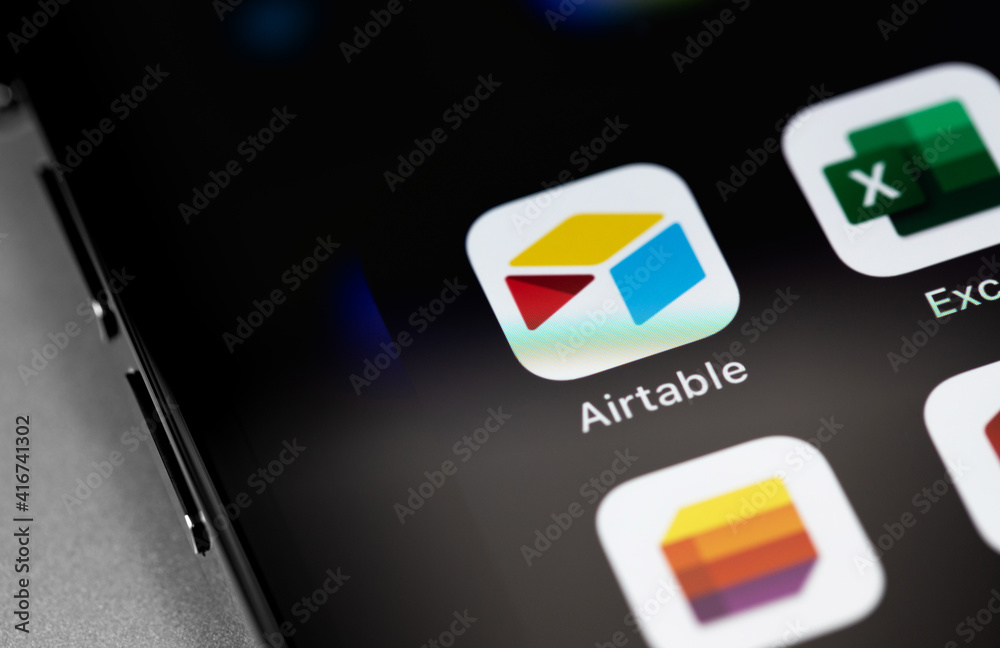 Airtable mobile app on screen smartphone, iPhone. Airtable is a cloud ...