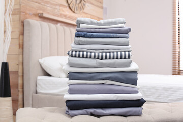 Wall Mural - Stack of clean bed linens in bedroom