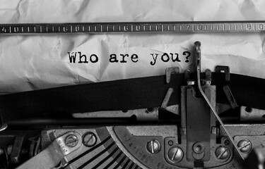 Poster - text who are you typed on retro typewriter