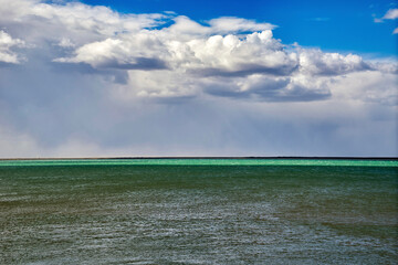 Sticker - Argentina, Santa Cruz. Puerto Santa Cruz, river Santa Cruz under stormy clouds.