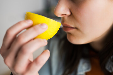 Woman Nose Sniffing Lemon Smell