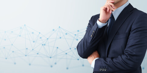 Fototapete - Thinking technology and network system. Businessperson in blue suit. Blue network structure.