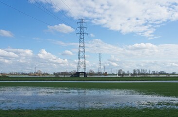 Electricity lines over the river Rhine near Wageningen in the Netherlands