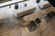 © bong - Above view of cafe with empty tables and chairs.