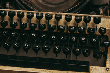 Fototapete - typewriter with keys on a wooden background retro style close-up macro