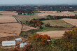 Scenic view of beautiful rural farm land in Eastern Iowa near Balltown during the fall. Landscape farming fields in the Mississippi River Valley with beautiful autumn colors.