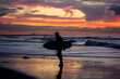 silhouette of a person surfing
