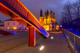 Fototapeta  - The Bishop Jordan Bridge over Cybina River and Poznan Cathedral at gorgeous sunset, Poznan, Poland.
