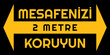 © Amarantha - Turkish warning text with two sided arrow on black background to remind people to keep -2 meters- social distance in public. Street sign, banner, warning placard.