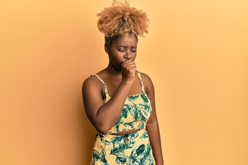 Sticker - Young african woman with afro hair wearing summer dress feeling unwell and coughing as symptom for cold or bronchitis. health care concept.