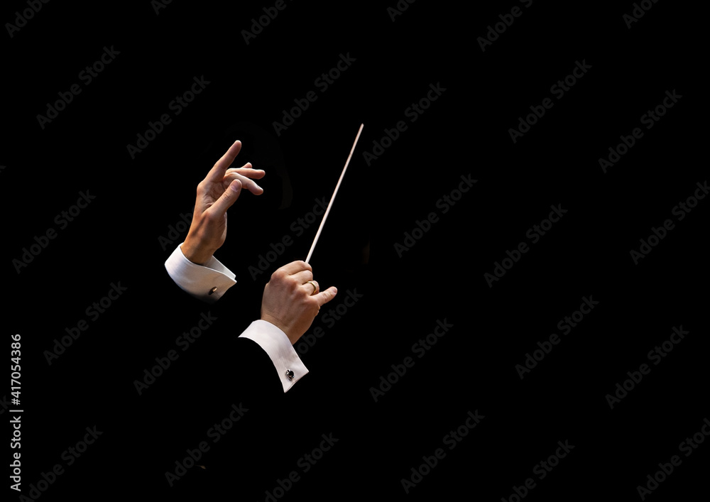 Conductor's hands on a black background - obrazy, fototapety, plakaty 