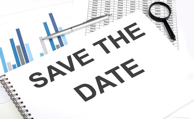 Poster - In the notebook, the text SAVE THE DATE , next to magnifier and a pen, the background is graphics.