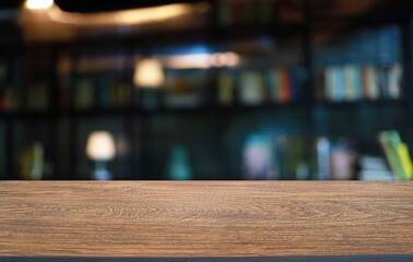 Empty wooden table in front of abstract blurred background of coffee shop . can be used for display or montage your products.Mock up for display of product