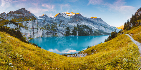 Fototapete - Idyllic panorama view of the lake Oeschinensee. Location place Swiss alps, Kandersteg, Europe.
