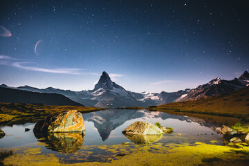 Wall Mural - famous peak matterhorn (cervino) under the starry sky. location place stellisee, switzerland, swiss 