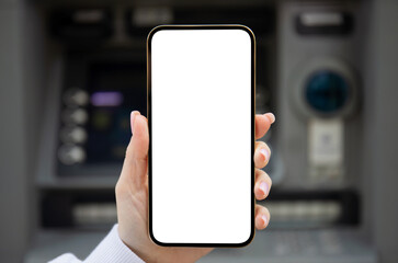 female hand holding phone with isolated screen on ATM background