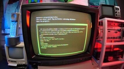 Retro programming concept on a vintage 80s 90s computer monitor.