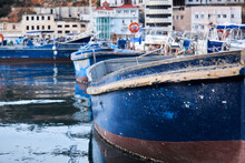 Background - Small Blue Fishing Boats In The Harbor