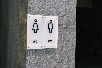 Public toilet. Signboard with the inscription male and female toilet. Toilet signage and toilet warning signs