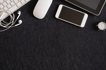 Poster - top view of office desk table with  calculator, notebook, plastic plant, smartphone and keyboard, graphic designer, Creative Designer concept.