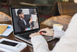 © Prostock-studio - Remote Communication. Unrecognizable Lady Having Web Conference On Laptop With Business Partner
