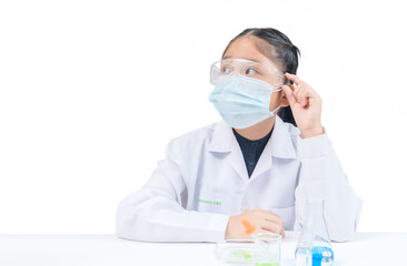 Wall Mural - a little scientist is thinking isolated on white background.