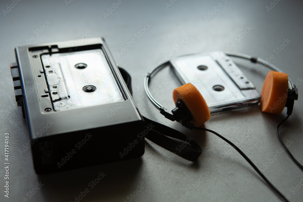 Music listening concept. Vintage cassette tape, audio player and ...