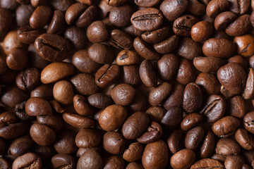 Roasted arabica coffee beans background. Background with coffee. 