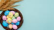Festive banner. Pandemic Easter. Food ornament. Colorful collection of cute painted eggs with face in mask chicken bunny pattern in basket with dry grass isolated on blue copy space background.