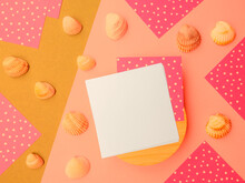 Flatlay Square Note Sheets,wooden Base,yellow Beige Paper, Pink Of White Polka Dots On Corners,pebbles.Design Copy Space