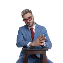 Poster - cool sexy businessman resting and rubbing his palms