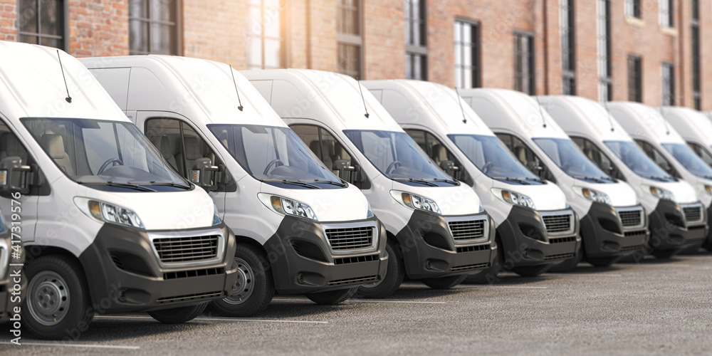 Delivery vans in a row.  Express delivery and shipment service concept.