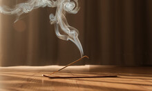 Burning Aromatic Incense Smoky Stick For Meditation And Relaxing. Aromatherapy Smoke For Yoga Concept.