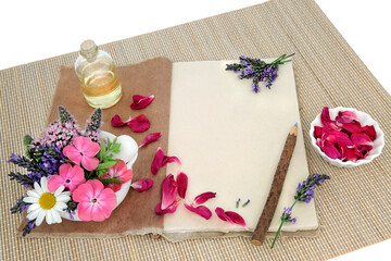 Wall Mural - Natural herbal medicine preparation with flowers & herbs & aromatherapy essential oil bottle with hemp notebook & rustic pencil. Still life for naturopathic health care concept.