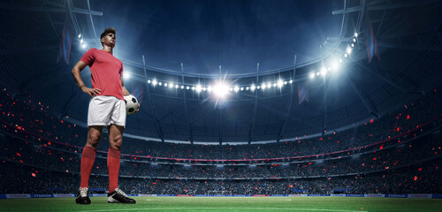 Wall Mural - Football player in the stadium. An imaginary stadium is modelled and rendered.