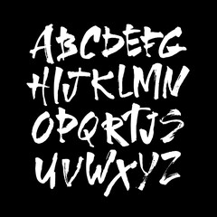 Wall Mural - vector acrylic brush style hand drawn alphabet font. calligraphy alphabet on a black background