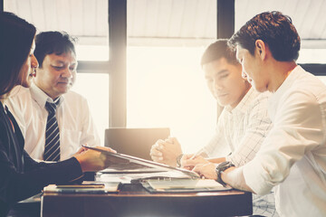 Business negotiation concept; Business people handshaking to sign contract of business at business meeting