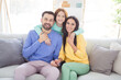 © deagreez - Photo of young cheerful family happy positive smile daughter hug mommy daddy enjoy time together home