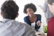 © Image Source RF - Colleagues meeting in office