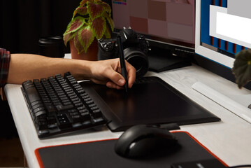 Poster - the left-hander works on the digitizer close up