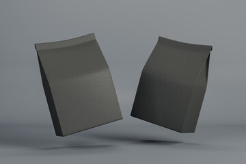 Aufkleber - Two black blank coffee packages above grey surface. Mockup.