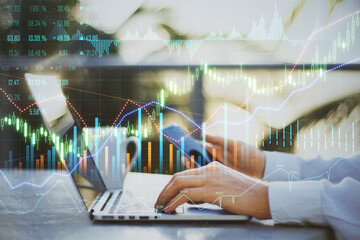 Poster - Businessman with smartphone typing laptop keyboard and digital trade and exchange market display with glowing candlestick and graphs