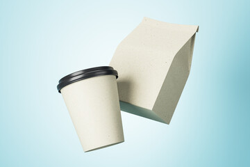 Poster - White paper cup to go and white coffee package with copyspace for your logo at blue background. Mockup