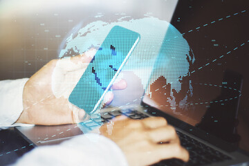 Aufkleber - Communication network and blockchain concept with digital world map and businessman typing laptop keyboard with smartphone