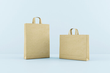 Poster - Blank recycled kraft paper bags with a space for your logo at blue background. Mock up