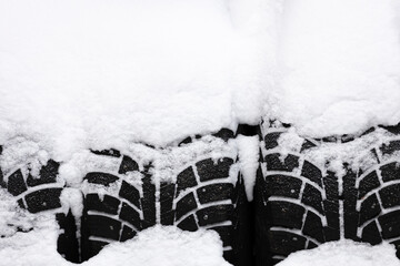 Poster - tires covered with snow close-up