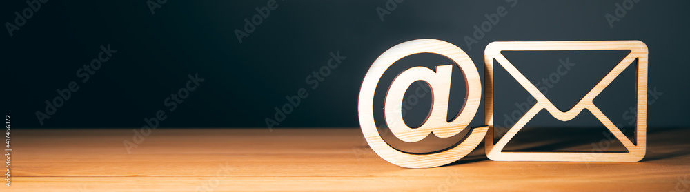 wooden letter with email sign