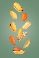 Wall Mural - Isolated nuts. Nine mix peanuts with and witout shell in the air isolate on green with clipping path as package design element. Full depth of field. Food levitation concept.