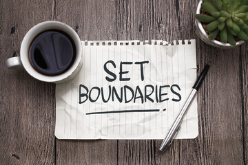 Set boundaries, text words typography written on paper against wooden background, life and business motivational inspirational